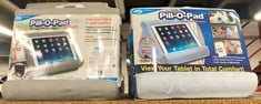 Lot 341  
            Edinburgh SR23 - Delivery Only 

                
4 X THE MULTI-ANGLE LAP-MOUNTED SOFT TABLET, BOOK AND E-READER STAND LIGHT BLUE.:...