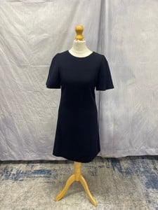 Lot 13  
            Edinburgh SR20 - Delivery Only 

                
GOAT CUT OUT BACK DRESS IN BLUE WOOL, SIZE: UK 6, ORIGINAL RRP £425: LOCATION - C...