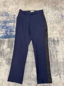 Lot 145  
            Edinburgh SR20 - Delivery Only 

                
RACIL CROPPED CIGARETTE TROUSERS WITH BLACK SIDE STRIPE IN NAVY BLUE WOOL, SIZE: ...