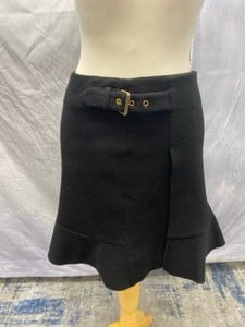 Lot 152  
            Edinburgh SR20 - Delivery Only 

                
BOUTIQUE MOSCHINO BOUCLE SKIRT IN BLACK WOOL, SIZE: UK 4, ORIGINAL RRP £319: LOCA...