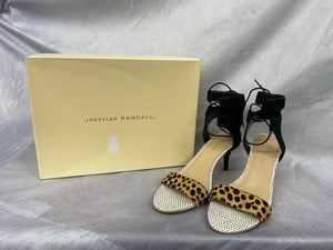 Lot 183  
            Edinburgh SR20 - Delivery Only 

                
LOEFFLER RANDAL AMBROSE LACE UP SANDALS IN CHEETAH AND BLACK LEATHER, SIZE: 9, OR...