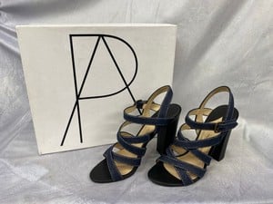 Lot 194  
            Edinburgh SR20 - Delivery Only 

                
PAUL ANDREW LOTUS 105 SANDALS IN BLUE DENIM AND BLACK CALFSKIN LEATHER, SIZE: 39,...