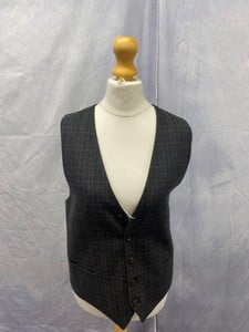 Lot 82  
            Edinburgh SR20 - Delivery Only 

                
DOLCE & GABBANA PLAID WAISTCOAT IN GREY POLYESTER, SIZE: UK 8, ORIGINAL RRP £535:...