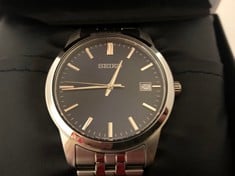 Lot 390  
            Edinburgh SR33 - Delivery Only 
                
SEIKO MEN ANALOG QUARTZ WATCH WITH STAINLESS STEEL STRAP SUR399P1.: LOCATION - ROW E