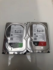 Lot 159  
            Edinburgh SR33 - Delivery Only 

                
SEAGATE 4TB BARRACUDA (ST4000DM004) SATA 3.5" HDD + SEAGATE 4TB IRONWOLF (ST4000V...