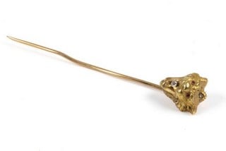 Lot 110  
            Nottingham Luxury Room - Delivery Only 

                
18K Yellow 0.03ct Diamond Lion Hat Pin, 6.5cm, 5.8g (Bent).  Auction Guide: £250-...