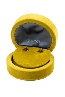 Lot 123  
            Nottingham Luxury Room - Delivery Only 

                
Gucci 18ct Gold Interlocking Stud Earrings, 3.5g. In Original Box and Pouch.  Auc...
