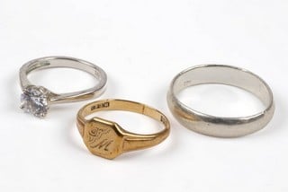 Lot 128  
            Nottingham Luxury Room - Delivery Only 

                
9ct Yellow Gold Patterned Signet Ring, Size O, 2.3g. Silver Band Ring, Size U. Cl...