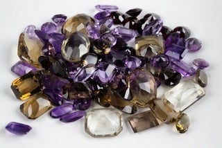 Lot 166  
            Nottingham Luxury Room - Delivery Only 

                
302.25ct Amethyst, Citrine, Garnet Faceted Mixed-cut Parcel of Gemstones, mixed