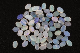 Lot 175  
            Nottingham Luxury Room - Delivery Only 

                
16.17ct Opal Cabochon Oval-cut Parcel of Gemstones, 6x4mm