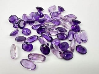 Lot 192  
            Nottingham Luxury Room - Delivery Only 

                
147.20ct African Amethyst Faceted Oval-cut Parcel of Gemstones, mixed