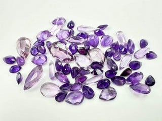 Lot 194  
            Nottingham Luxury Room - Delivery Only 

                
147.97ct African Amethyst Faceted Pear-cut Parcel of Gemstones, mixed