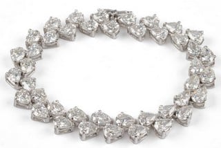 Lot 1  
            Nottingham Luxury Room - Delivery Only 

                
18K White 16.76ct Pear-cut 42 Stone Diamond Bracelet, 15.5cm, 19g. Colour H, Clar...