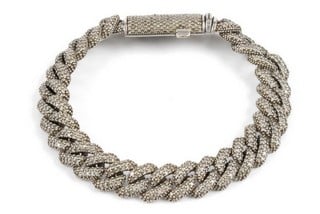 Lot 52  
            Nottingham Luxury Room - Delivery Only 

                
9ct White Gold Diamond Pavé Set Bracelet, 17.5cm, 22.7g.  Auction Guide: £500-£70...
