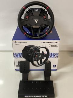 Lot 133  
            Birmingham Tech  - Parcel Delivery Only 

                
THRUSTMASTER T598 RACING WHEEL AND PEDAL (ORIGINAL RRP - £449) IN BLACK. (POWER C...