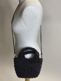 Lot 108  
            Birmingham Premium - Parcel Delivery Only 

                
ARKET BEADED MINI BAG ORIGINAL RRP £149