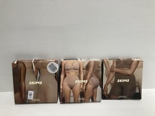 Lot 217  
            Birmingham Premium - Parcel Delivery Only 

                
3 X CLOTHES TO INCLUDE SKIMS SEAMLESS SCULPT MID THIGH BODYSUIT (SIZE S) TOTAL OR...