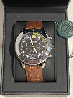 Lot 11  
            Birmingham SR107 - Parcel Delivery Only 
                
GAMAGES ENDEAVOUR MECHANICAL QUARTZ SILVER SKU GA 2111 WATCH ORIGINAL RRP £825