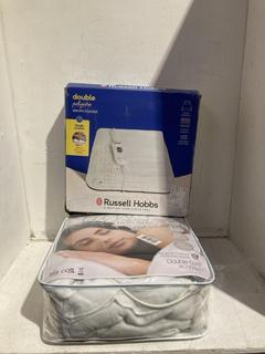 Lot 139  
            Birmingham SR107 - Parcel Delivery Only 
                
2 X ELECTRIC HEATING BLANKETS TO INCLUDE RUSSELL HOBBS DOUBLE POLYESTER ELECTRIC ...