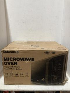 Lot 408  
            Birmingham SR107 - Parcel Delivery Only 
                
SAMSUNG MICROWAVE OVEN MODEL MS23K3513AK