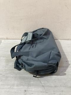 Lot 481  
            Birmingham SR107 - Parcel Delivery Only 
                
THULE STEEL BLUE DUFFLE BAG