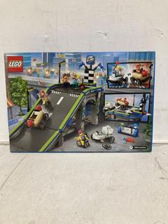 Lot 715  
            Birmingham SR107 - Parcel Delivery Only 

                
LEGO NO LIMITS RACE CAMP RAMP