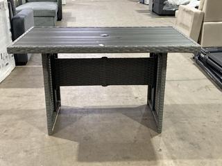 Lot 193  
            Birmingham SR106 - Collection or Optional Delivery Available 

                
RATTAN OUTDOOR FURNITURE DINING TABLE (LOCATION: A6)