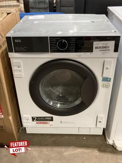 Lot 36  
            Birmingham SR106 - Collection or Optional Delivery Available 

                
AEG FREESTANDING 8KG INTEGRATED WASHER DRYER IN WHITE (003439851) ORIGINAL RRP £1...