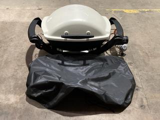 Lot 522  
            Birmingham SR106 - Collection or Optional Delivery Available 

                
WEBER Q 1000 LP TITANIUM GAS GRILL - ‎50060074 - ORIGINAL RRP £262.80 (LOCATION: ...