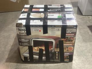 Lot 632  
            Birmingham SR106 - Collection or Optional Delivery Available 

                
NINJA WOODFIRE ELECTRIC OUTDOOR OVEN - ORIGINAL RRP £279 (LOCATION: RACKINGS)