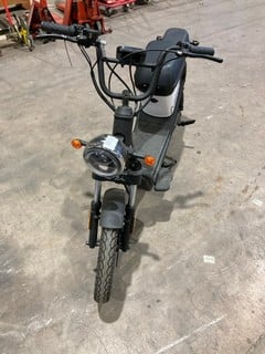 Lot 209  
            Birmingham - Collection Only 

                
EZI MINI BLACK ELECTRIC SCOOTER