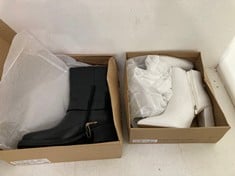Lot 354  
            BIRMINGHAM SR111 - PARCEL DELIVERY ONLY 
                
SCHUH WOMEN’S BOOTS BLACK UK 6 TO ALSO INCLUDE WOMEN’S BOOTS WHITE.