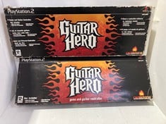 Lot 394  
            BIRMINGHAM SR111 - PARCEL DELIVERY ONLY 
                
2 X GUITAR HERO GAME & CONTROLLER.