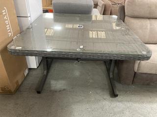 Lot 309  
            Chesterfield SR35 - Collection or Optional Delivery Available 

                
OUTDOOR RATTAN TABLE WITH GLASS TOP FINISHED IN GREY (LOCATION: SR35)