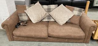 Lot 319  
            Chesterfield SR35 - Collection or Optional Delivery Available 

                
LARGE TWO SEATER SOFA FINISHED IN A SUEDE BROWN/RED WITH MIXTURE OF CUSHIONS AND ...