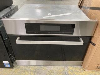 Lot 621  
            Chesterfield SR35 - Collection or Optional Delivery Available 

                
MIELE- STEAM OVEN WITH NAVITRONIC CONTROLS- IN BRUSHED SILVER- MODEL DG5080- ORIG...