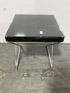Lot 71  
            Chesterfield SR35 - Collection 

                
DFS WOODEN SIDE TABLE WITH GLASS TOP - COLLECTION ONLY (LOCATION: SR35) (BNX1OCBNX)