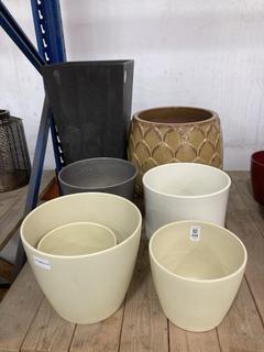 Lot 428  
            Chesterfield SR36 - Collection Only 

                
ASSORTED PLANT POTS TO INCLUDE PLANT POT IN BLACK] (LOCATION: SR36 A1)