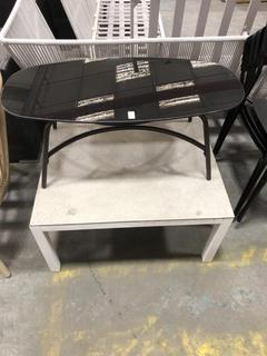 Lot 768  
            Chesterfield SR36 - Collection Only 

                
SMALL GLASS COFFEE TABLE IN BLACK TO INCLUDE GREY SQUARE TABLE IN GREY ( COLLECTI...