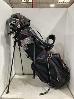 Lot 853  
            Chesterfield SR36 - Collection or Optional Delivery Available 

                
FAZER GOLF BAG IN BLACK/GREY/RED TO INCLUDE ASSORTED GOLF CLUBS (LOCATION: SR36 B6)