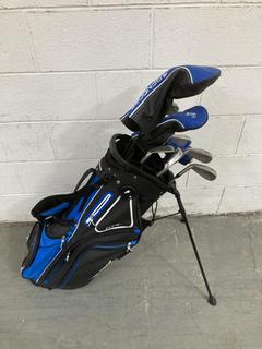 Lot 865  
            Chesterfield SR36 - Collection or Optional Delivery Available 

                
BENROSS GOLF BAG IN BLACK/BLUE TO INCLUDE ASSORTED GOLF CLUBS (LOCATION: SR36 B6)...