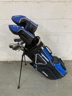 Lot 869  
            Chesterfield SR36 - Collection or Optional Delivery Available 

                
BEN ROSS GOLF BAG IN BLUE/BLACK WITH ASSORTED GOLF CLUBS (LOCATION: SR36 B6) (20)