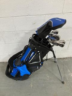 Lot 875  
            Chesterfield SR36 - Collection or Optional Delivery Available 

                
BEN ROSS GOLF BAG IN BLUE/BLACK/WHITE TO INCLUDE ASSORTED GOLF CLUBS (LOCATION: S...