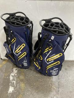 Lot 925  
            Chesterfield SR36 - Collection or Optional Delivery Available 

                
2X STROMBERG 'THE OPEN' GOLF BAGS BLUE/BLACK WITH YELLOW ZIPS/ACCENTS (LOCATION: ...