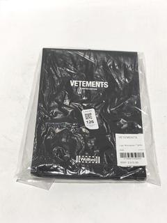 Lot 126  
            Chesterfield SR44 - Parcel Delivery Only 

                
VETEMENTS LOGO MONOGRAM TIGHTS IN NUDE SIZE XS - ORIGINAL RRP £315 (LOCATION: L6)