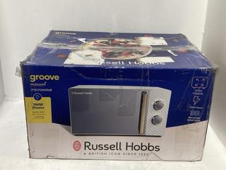 Lot 1358  
            Chesterfield SR44 - Parcel Delivery Only 

                
RUSSELL HOBBS GROOVE MANUAL MICROWAVE (LOCATION: H5)