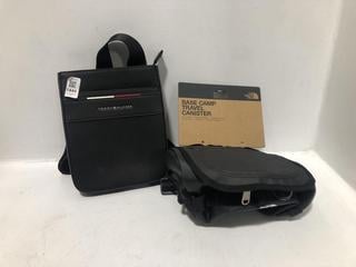 Lot 1444  
            Chesterfield SR44 - Parcel Delivery Only 

                
TOMMY HILFIGER LEATHER BODY-CROSS BAG IN BLACK TO INCLUDE THE NORTH FACE TRAVEL B...