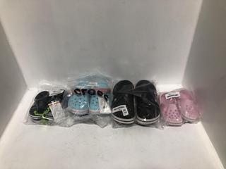 Lot 1462  
            Chesterfield SR44 - Parcel Delivery Only 

                
4 X ASSORTED KIDS CROCS TO INCLUDE CROCS CLASSIC CLOGS IN BLACK UK SIZE 7 (LOCATI...