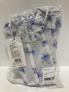 Lot 330  
            Chesterfield SR44 - Parcel Delivery Only 

                
NO DRESS FLORAL JACQUARD RUFFLED DORSET IN WHITE SIZE M - ORIGINAL RRP £308 (LOCA...
