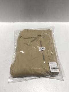 Lot 423  
            Chesterfield SR44 - Parcel Delivery Only 

                
RANDOM IDENTITIES ELASTIC PANTS IN BEIGE SIZE XS ORIGINAL RRP- £355 (LOCATION: L10)